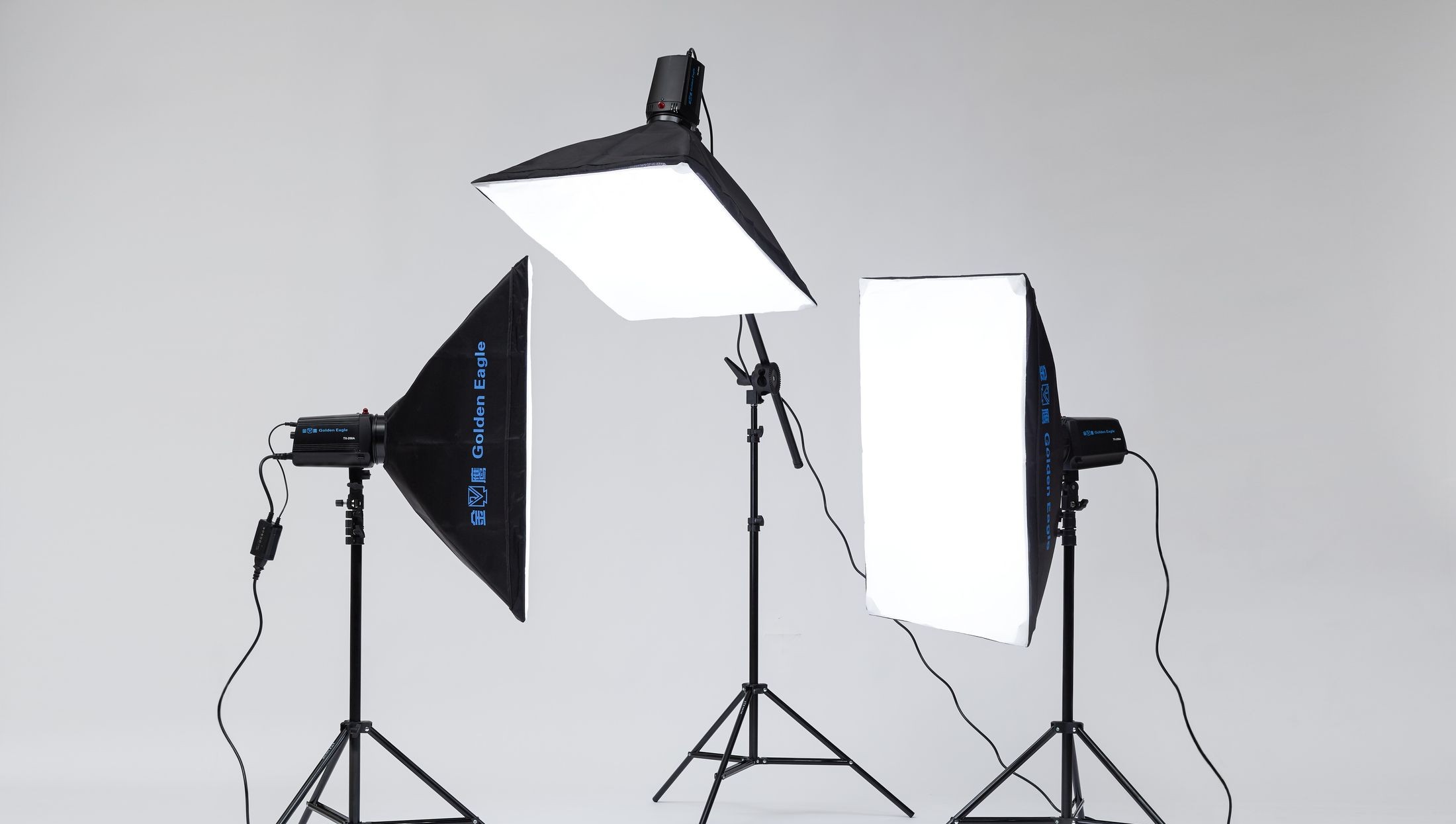 TX-250 kit lighting a product table with overhead and side softboxes